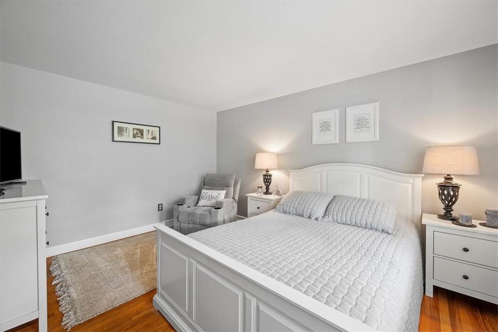 505 Hudderford Road Pittsburgh, PA 15237 - Photo 29 of 43 a bedroom with a bed and a night stand