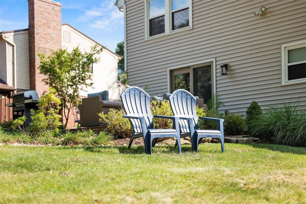 505 Hudderford Road Pittsburgh, PA 15237 - Photo 41 of 43 a view of a chair and table in backyard of the house