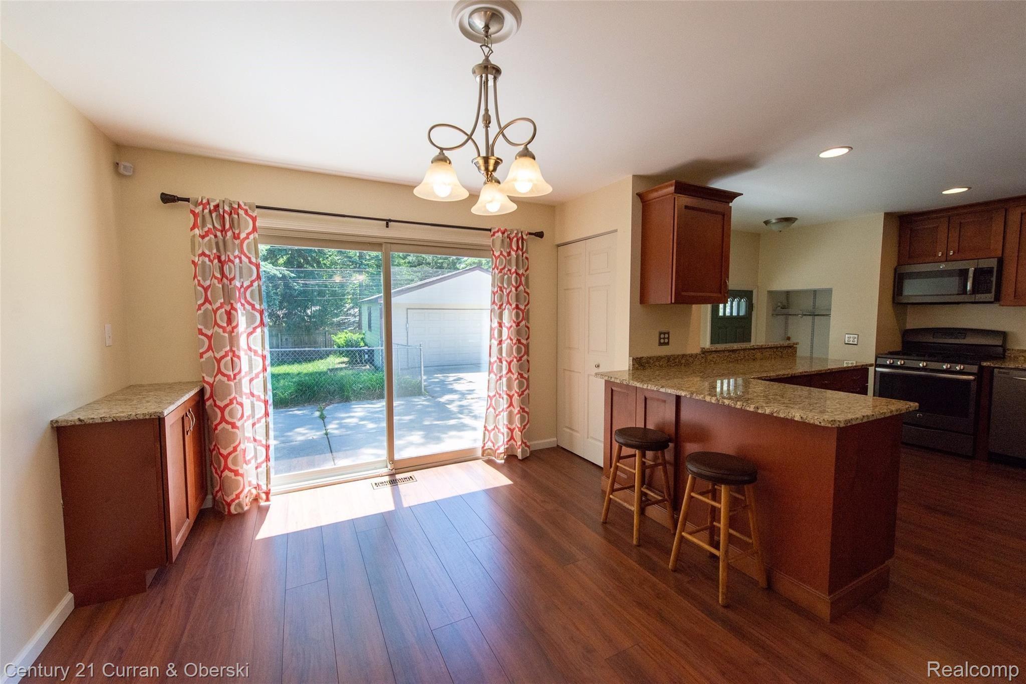 1909 Massoit Road Royal Oak, MI 48073 - Photo 10 of 30 Dining Area with Doorwall to Yard