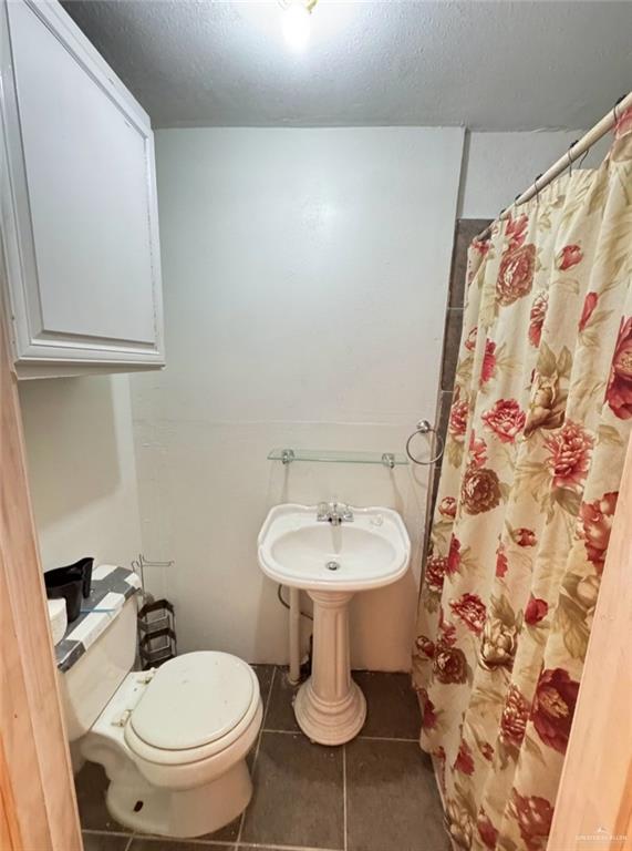 3702 Marla Drive Mission, TX 78572 - Photo 14 of 15 a bathroom with a sink and a mirror