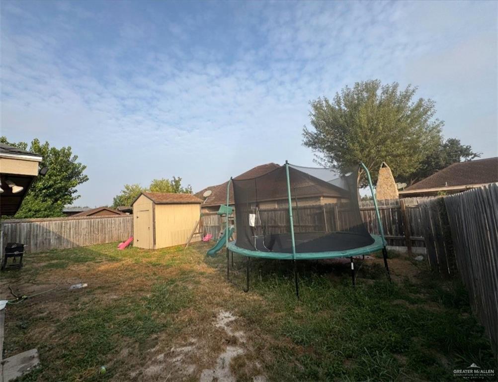 3702 Marla Drive Mission, TX 78572 - Photo 15 of 15 a backyard of a house with table and chairs
