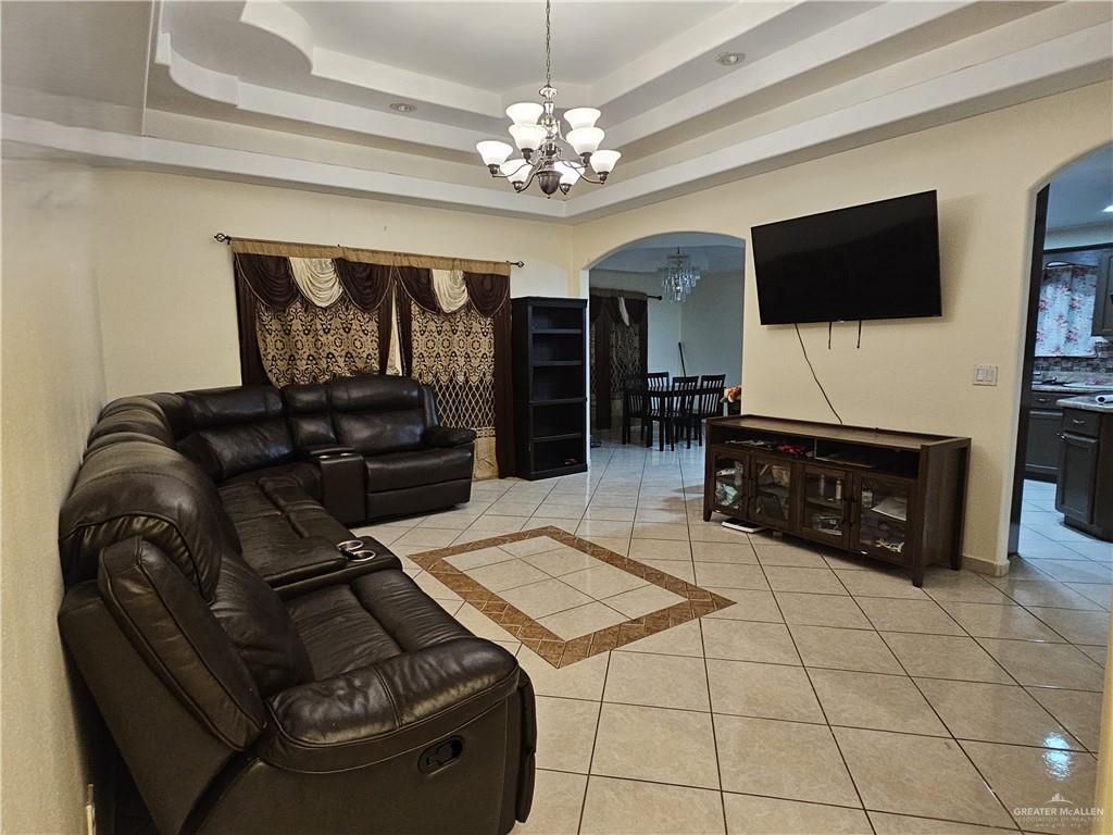 3702 Marla Drive Mission, TX 78572 - Photo 3 of 15 a living room with furniture and a flat screen tv