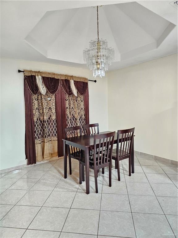 3702 Marla Drive Mission, TX 78572 - Photo 4 of 15 a view of a dining room with furniture and chandelier