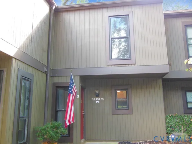 a view of a house with a glass door