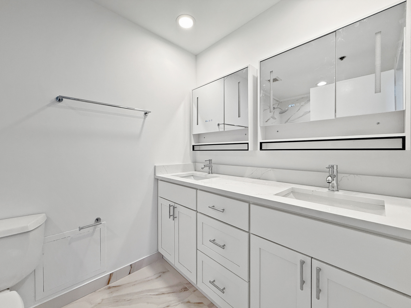 5 North Wabash Avenue, Unit 1201 Chicago, IL 60602 - Photo 24 of 33 a bathroom with a sink and a mirror with toilet