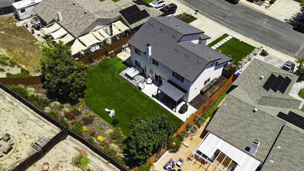 3577 Winslow Road Oceanside, CA 92056 - Photo 46 of 53 an aerial view of a house with a garden and swimming pool
