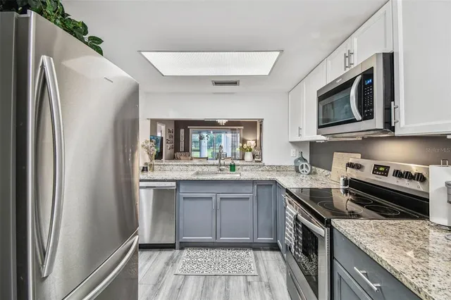 a bathroom with a mirror a sink and a mirror