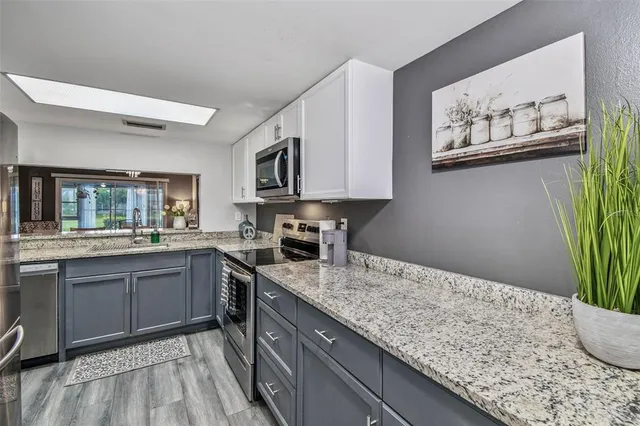 a bedroom with a bed and a walk in closet