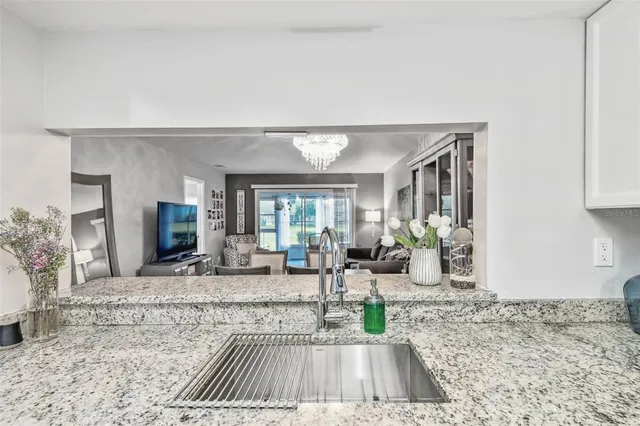 a bedroom with a bed and a table in it