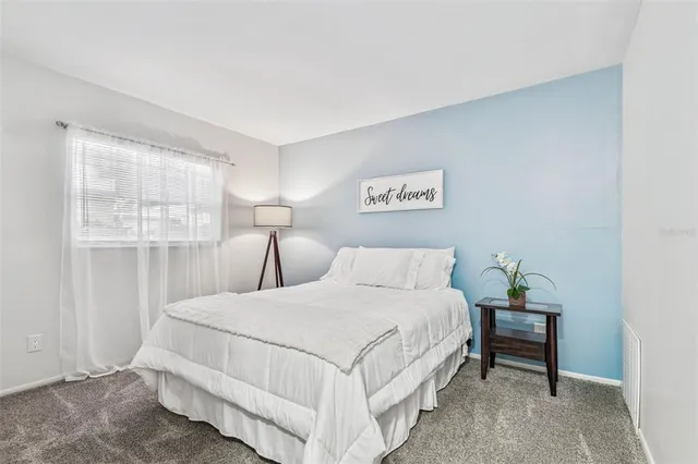 an aerial view of a house with a garden