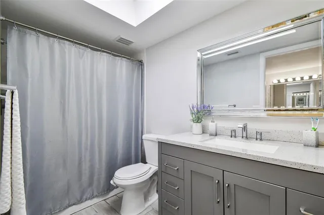 a aerial view of a house with a big yard