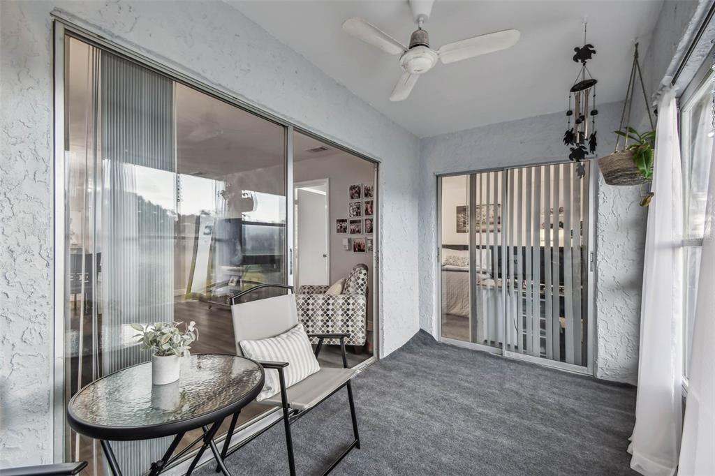9613 Midiron Court, Unit 39A New Port Richey, FL 34655 - Photo 41 of 76 a view of a livingroom with furniture and windows