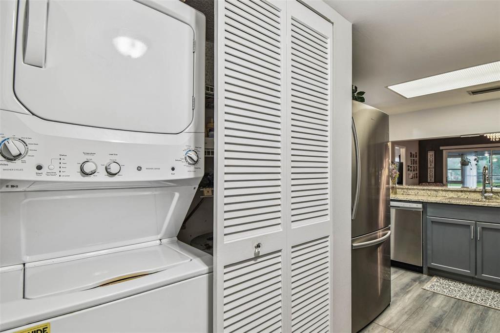 9613 Midiron Court, Unit 39A New Port Richey, FL 34655 - Photo 42 of 76 a utility room with washer and dryer