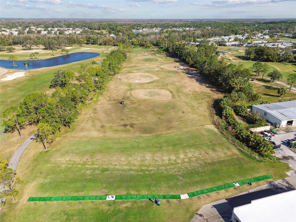 9613 Midiron Court, Unit 39A New Port Richey, FL 34655 - Photo 55 of 76 a view of an outdoor space and mountain view