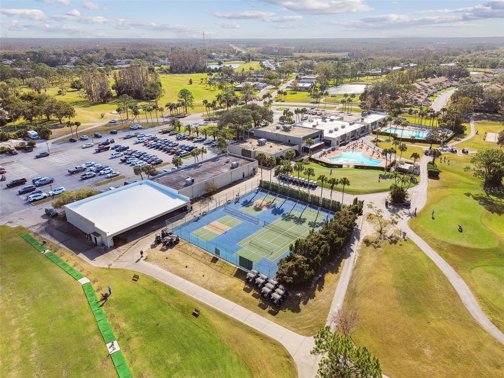 9613 Midiron Court, Unit 39A New Port Richey, FL 34655 - Photo 57 of 76 an aerial view of residential houses with outdoor space