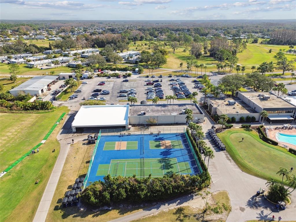 9613 Midiron Court, Unit 39A New Port Richey, FL 34655 - Photo 58 of 76 an aerial view of residential houses with outdoor space
