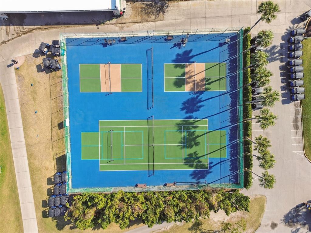 9613 Midiron Court, Unit 39A New Port Richey, FL 34655 - Photo 59 of 76 a view of a brick house with a small yard