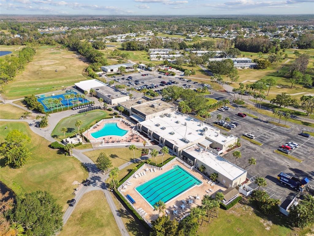 9613 Midiron Court, Unit 39A New Port Richey, FL 34655 - Photo 64 of 76 an aerial view of residential houses with outdoor space