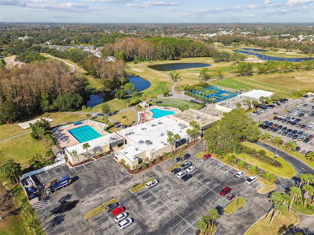 9613 Midiron Court, Unit 39A New Port Richey, FL 34655 - Photo 65 of 76 an aerial view of residential houses with outdoor space