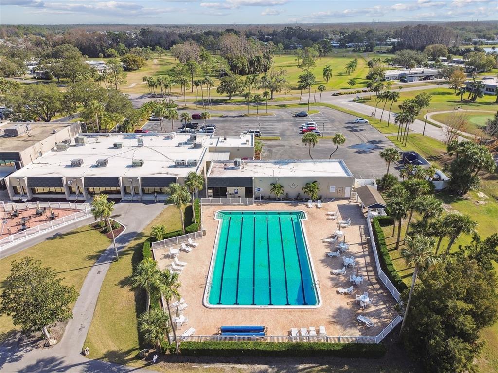 9613 Midiron Court, Unit 39A New Port Richey, FL 34655 - Photo 69 of 76 an aerial view of residential houses with outdoor space