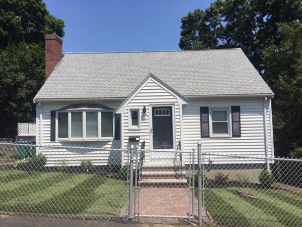 31 Spring View Drive Lynn, MA 01904 - Photo 2 of 12 a front view of a house with a yard