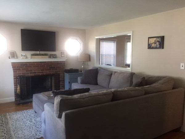 31 Spring View Drive Lynn, MA 01904 - Photo 3 of 12 a living room with furniture and a fireplace