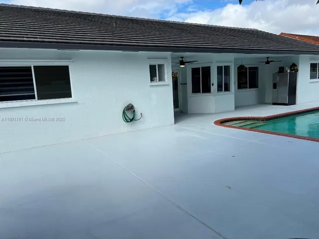 a view of a house with roof deck