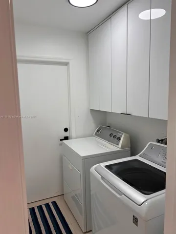 a view of utility room with washer and dryer