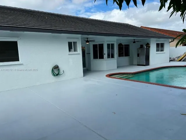 a view of outdoor space and front view of a house