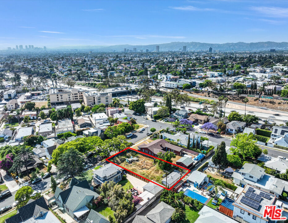 2516 13th Avenue Los Angeles, CA 90018 - Photo 3 of 7 an aerial view of residential houses with outdoor space