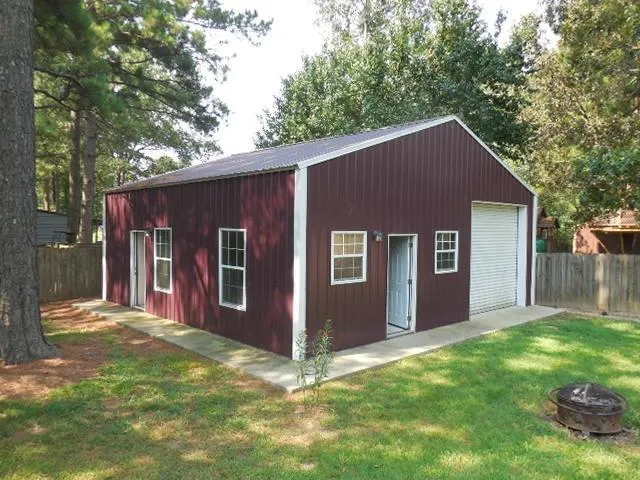 a backyard of a house with seating space