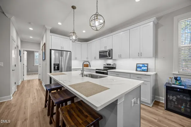 a bedroom with a bed and a dresser