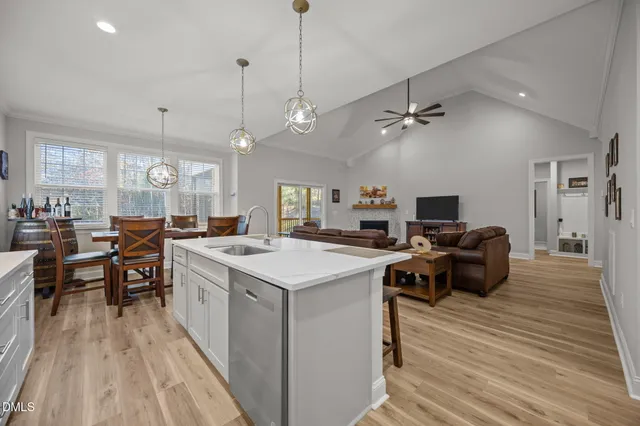 a bathroom with a sink a toilet and a bathtub