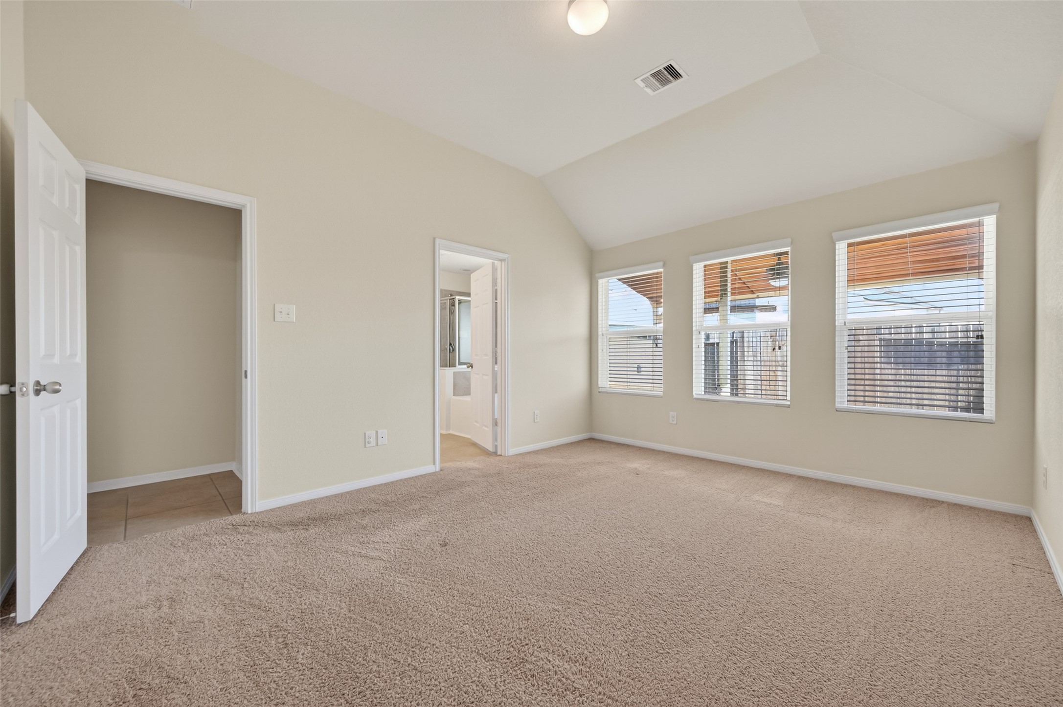 2487 Elm Crossing Trail Spring, TX 77386 - Photo 22 of 46 a view of an empty room with a window