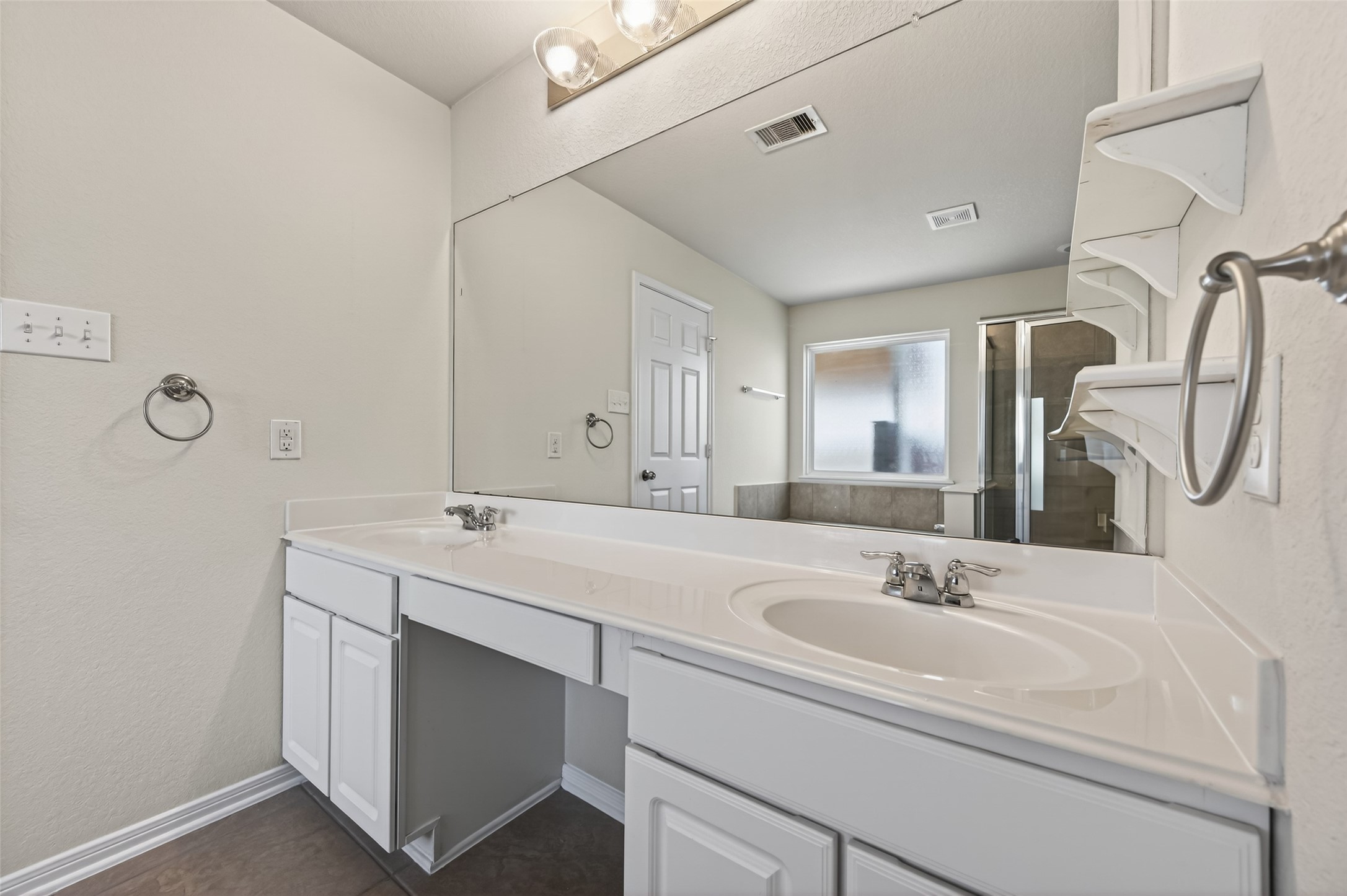 2487 Elm Crossing Trail Spring, TX 77386 - Photo 27 of 46 a bathroom with a sink and a mirror