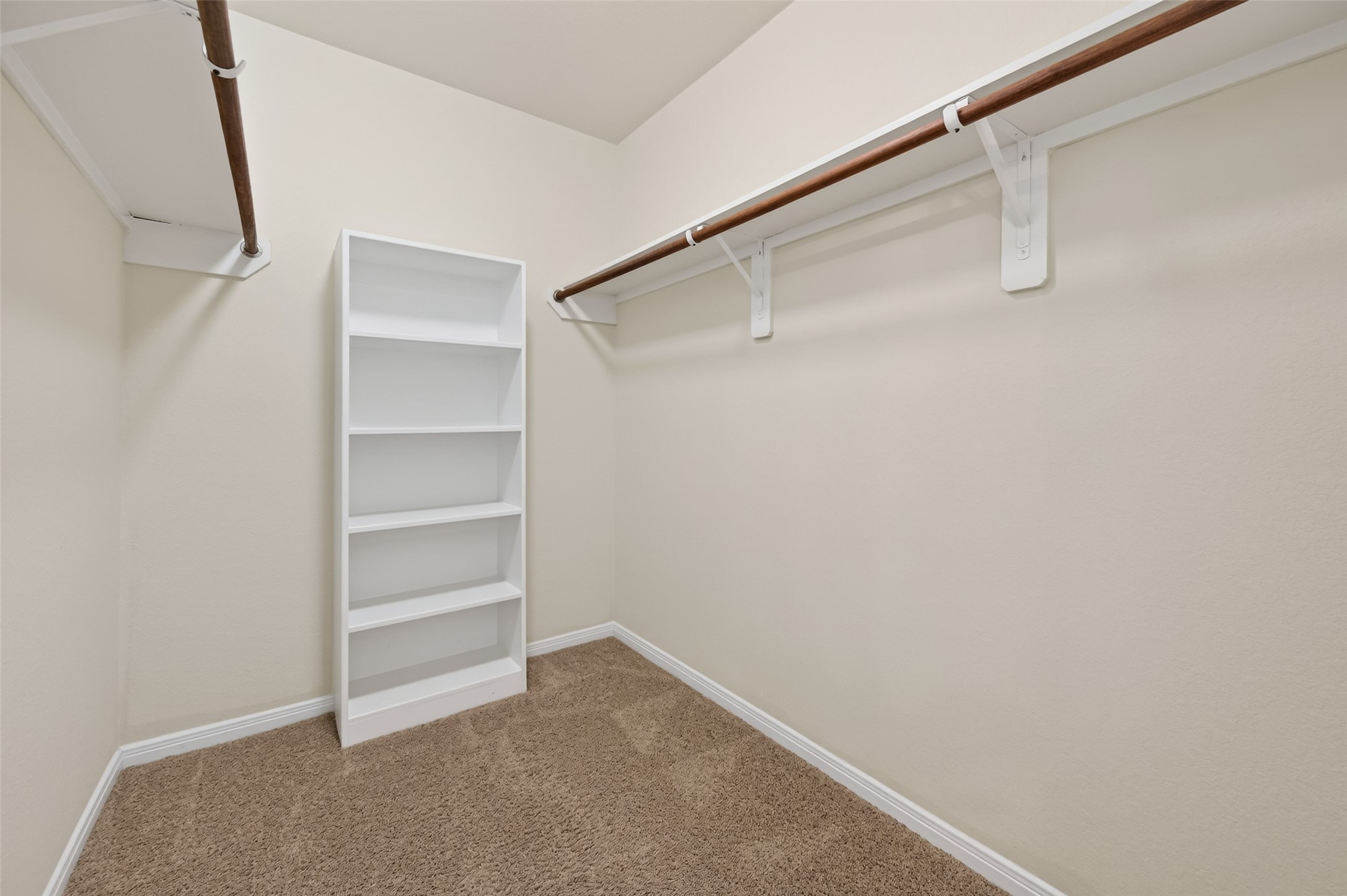 2487 Elm Crossing Trail Spring, TX 77386 - Photo 28 of 46 a view of an empty walk in closet