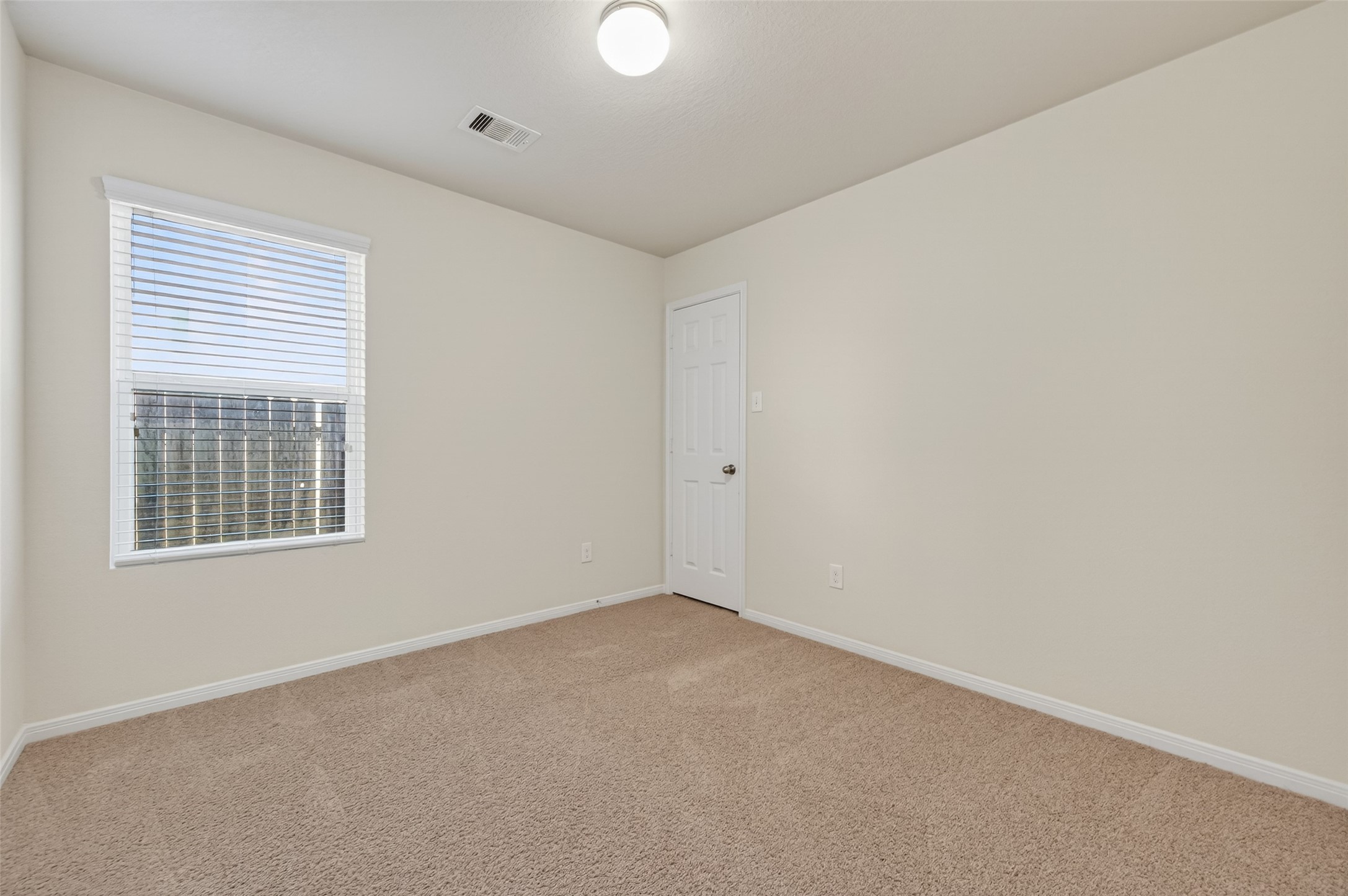 2487 Elm Crossing Trail Spring, TX 77386 - Photo 29 of 46 an empty room with a window