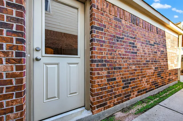 a view of small space with wooden wall