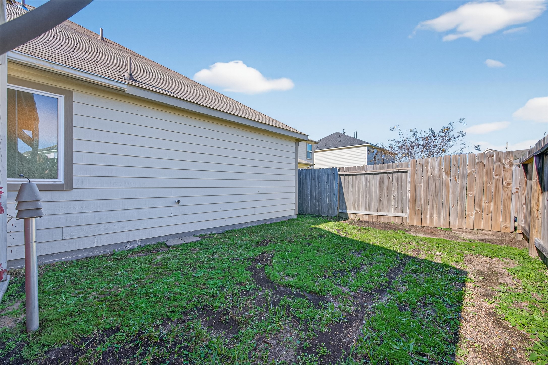 2487 Elm Crossing Trail Spring, TX 77386 - Photo 41 of 46 a view of a backyard with wooden fence