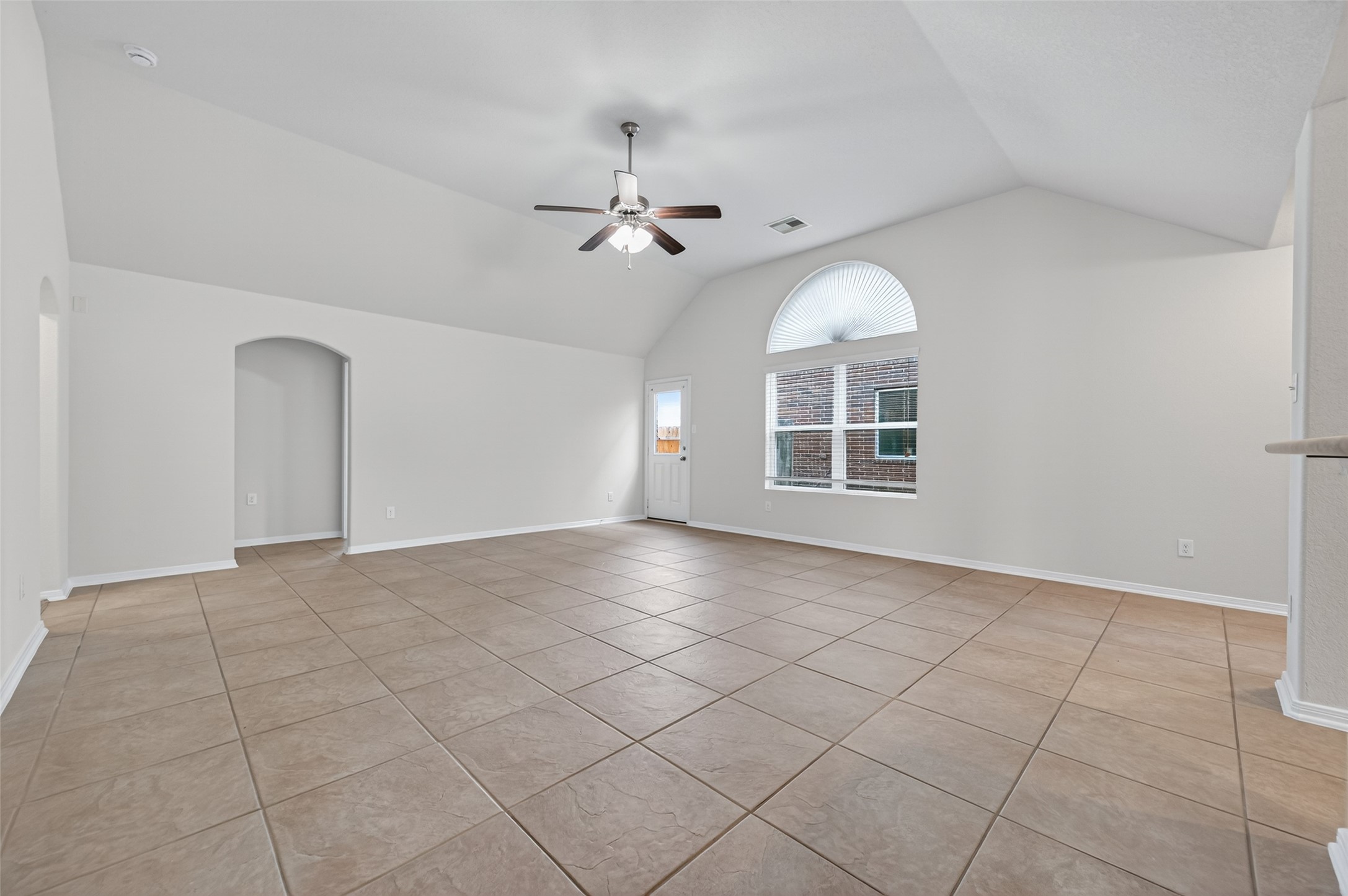 2487 Elm Crossing Trail Spring, TX 77386 - Photo 8 of 46 a view of an empty room with a window