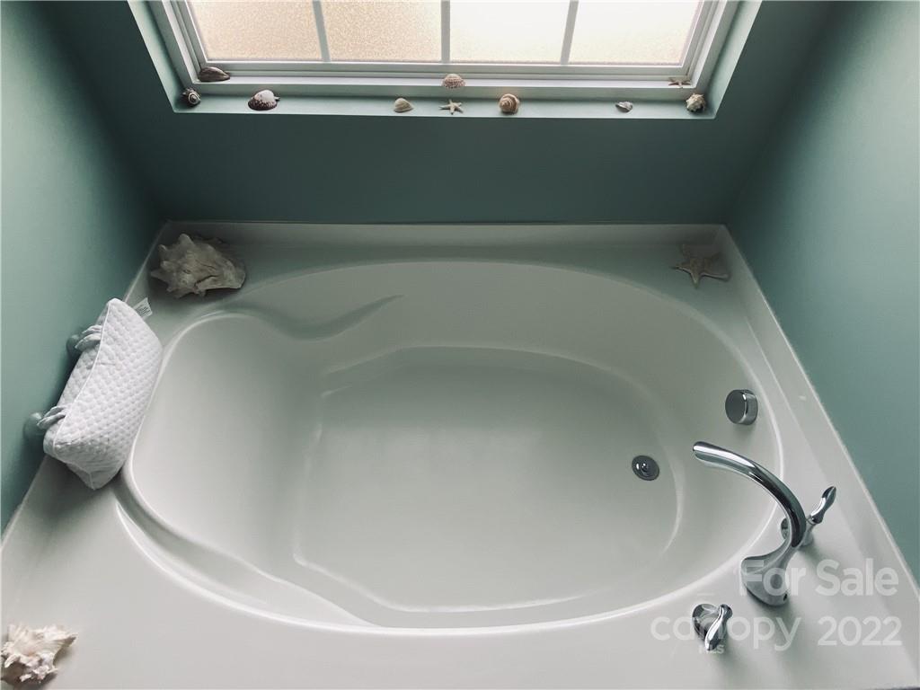 5604 Whitehawk Hill Road Mint Hill, NC 28227 - Photo 11 of 18 a close view of a bathtub in bathroom