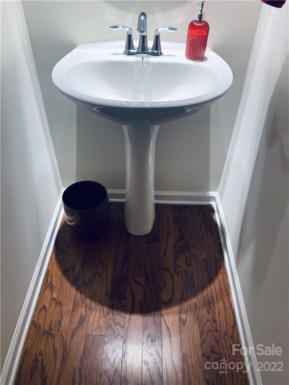 5604 Whitehawk Hill Road Mint Hill, NC 28227 - Photo 6 of 18 a bathroom with a sink and a mirror