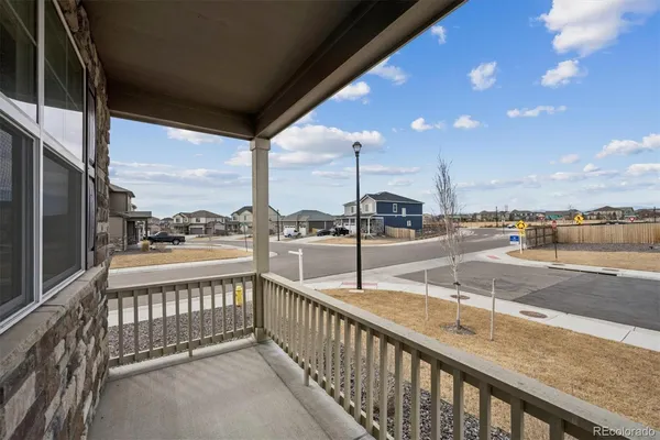 a view of a balcony with city view