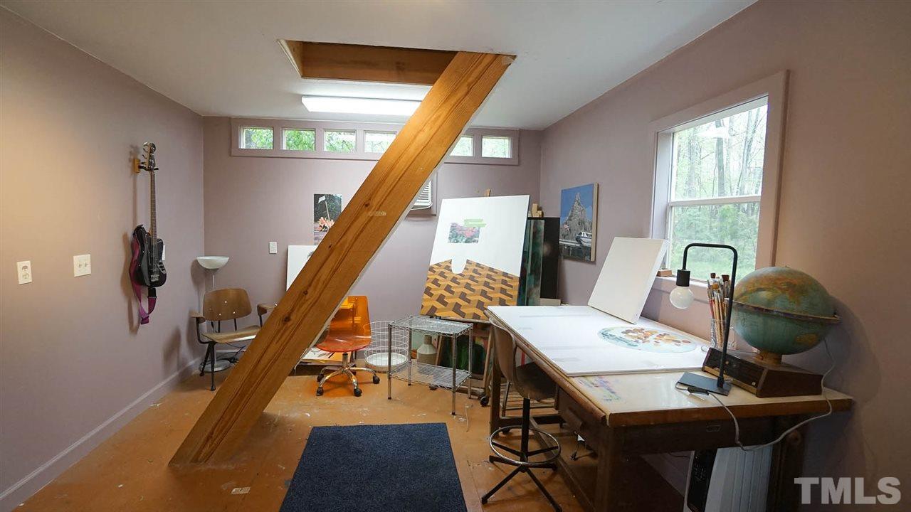 809 Tinkerbell Road Chapel Hill, NC 27517 - Photo 17 of 19 a view of a workspace with furniture and entryway