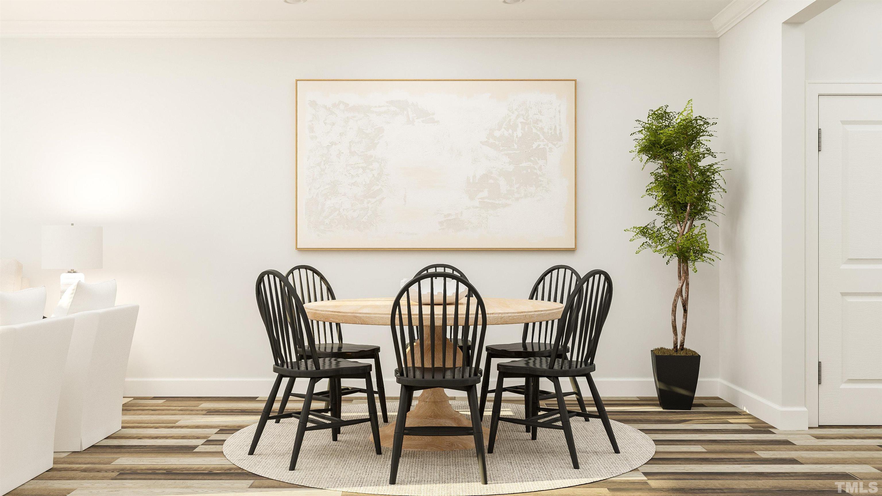 To Be Added, Unit 434 Apex, NC 27502 - Photo 4 of 9 a view of a dining room with furniture and wooden floor