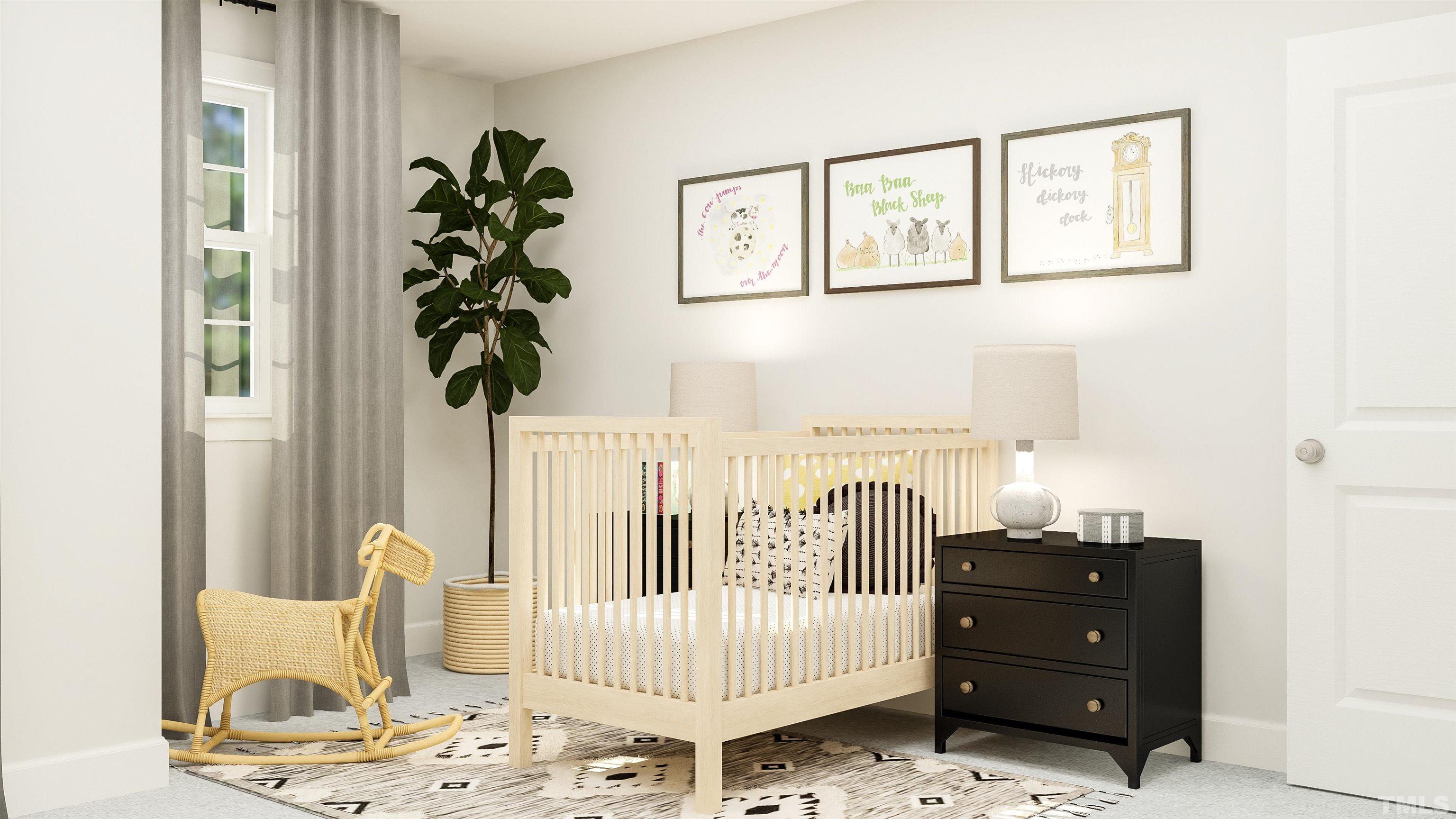 To Be Added, Unit 434 Apex, NC 27502 - Photo 8 of 9 a living room with a baby crib furniture and a window