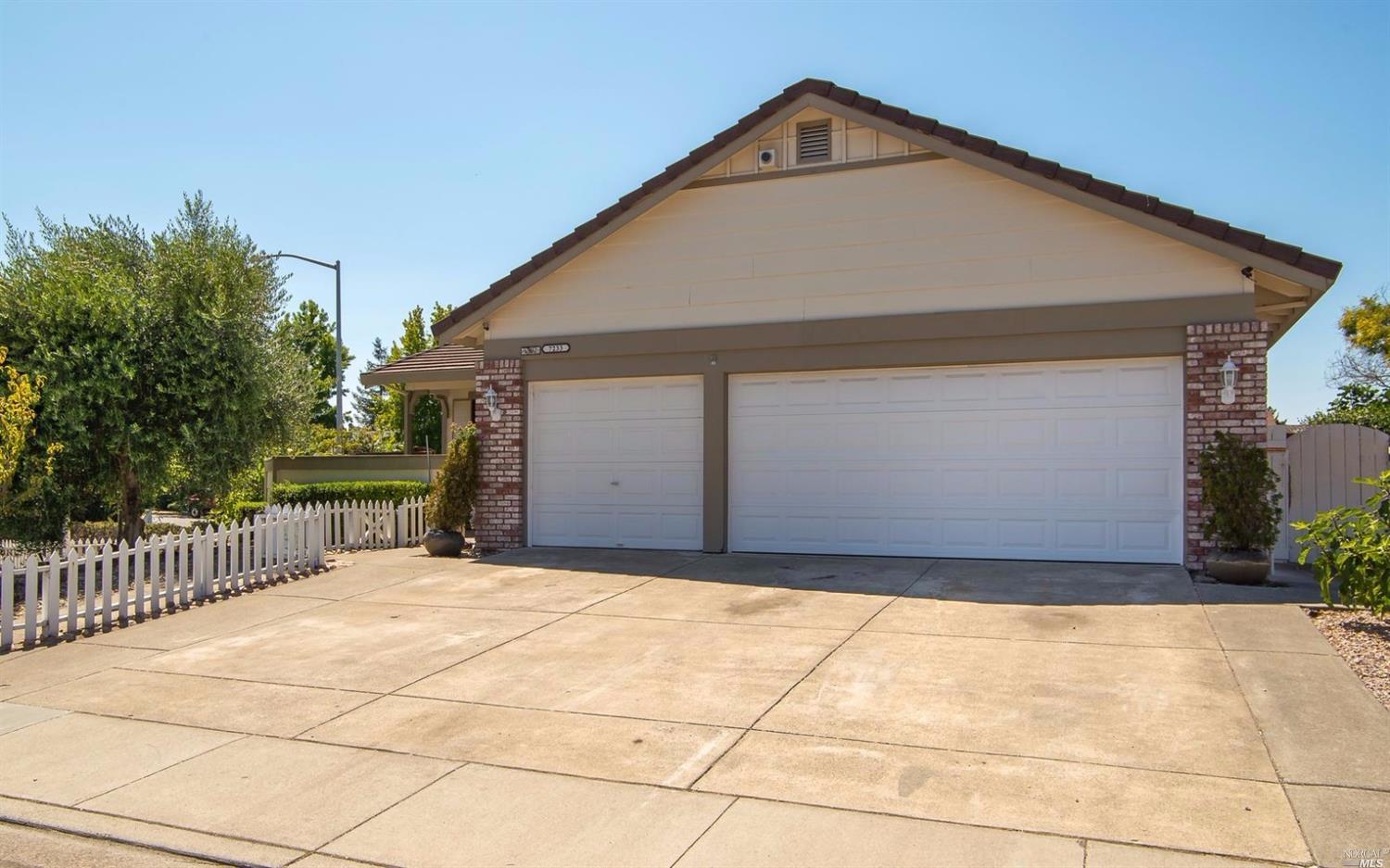 7233 Roxanne Lane Rohnert Park, CA 94928 - Photo 1 of 1 a front view of a house with a garage