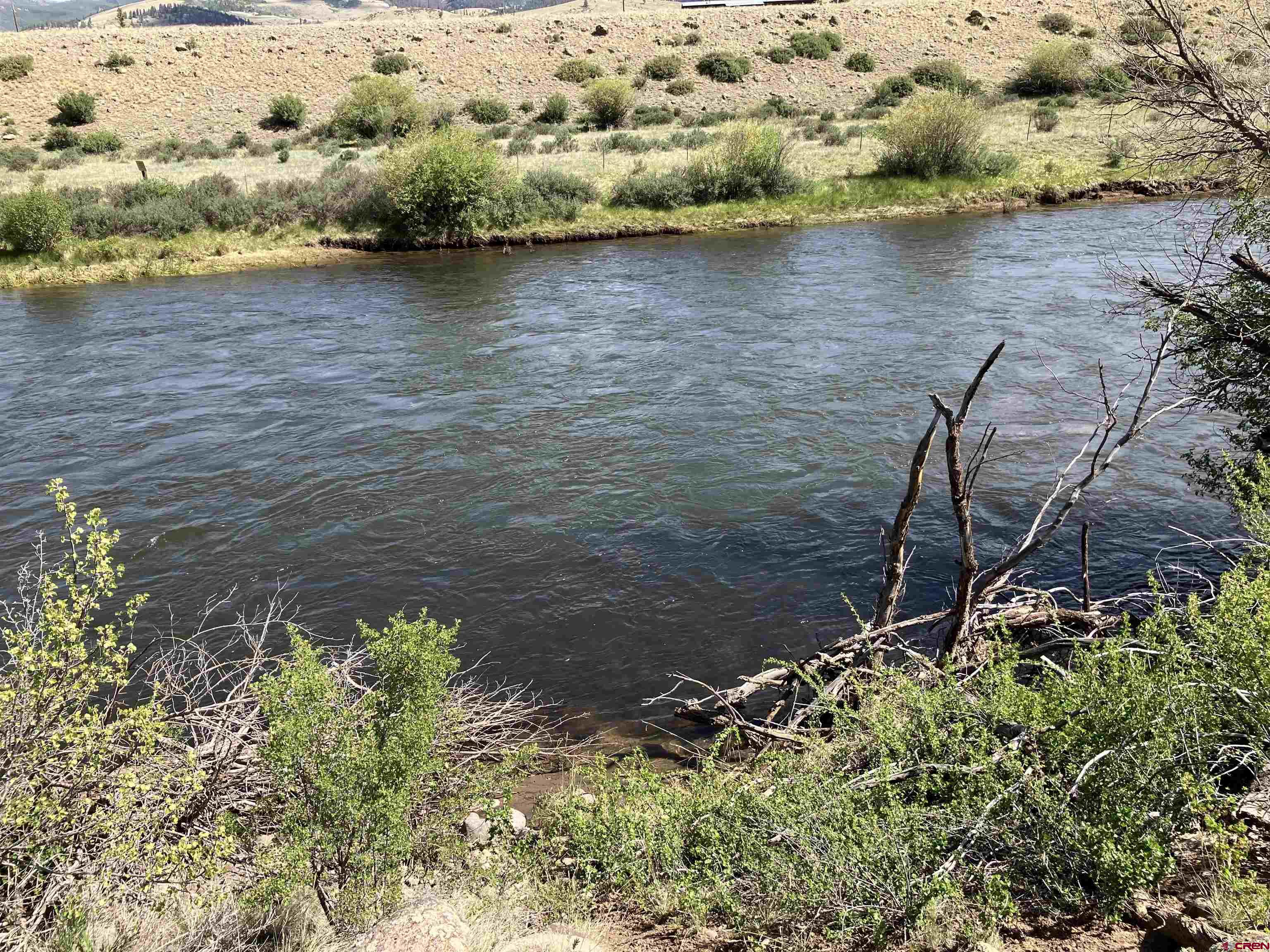 442 Deep Creek Road Creede, CO 81130 - Photo 21 of 45 a view of a lake with an ocean view