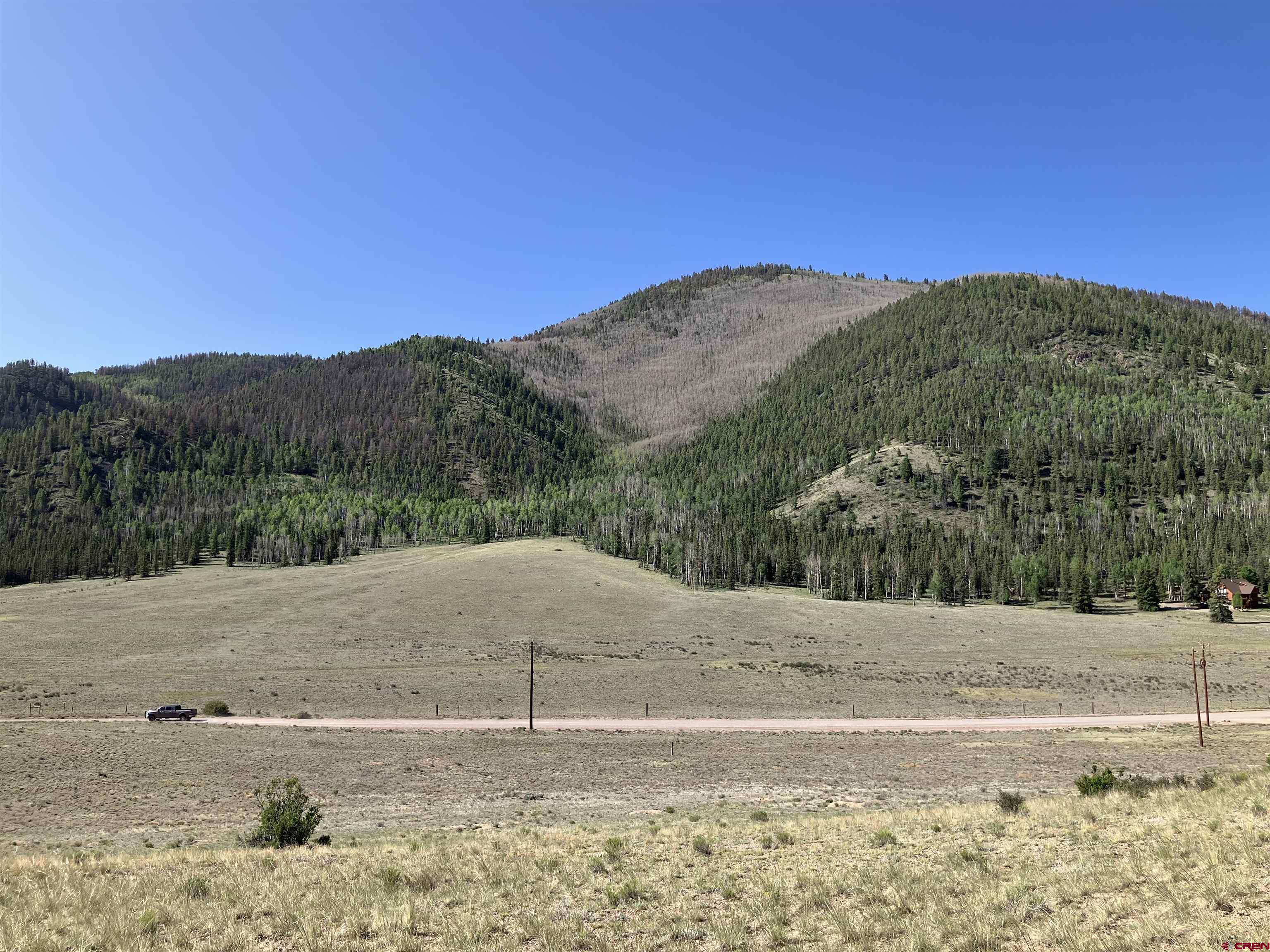 442 Deep Creek Road Creede, CO 81130 - Photo 25 of 45 a view of a dry yard with mountain