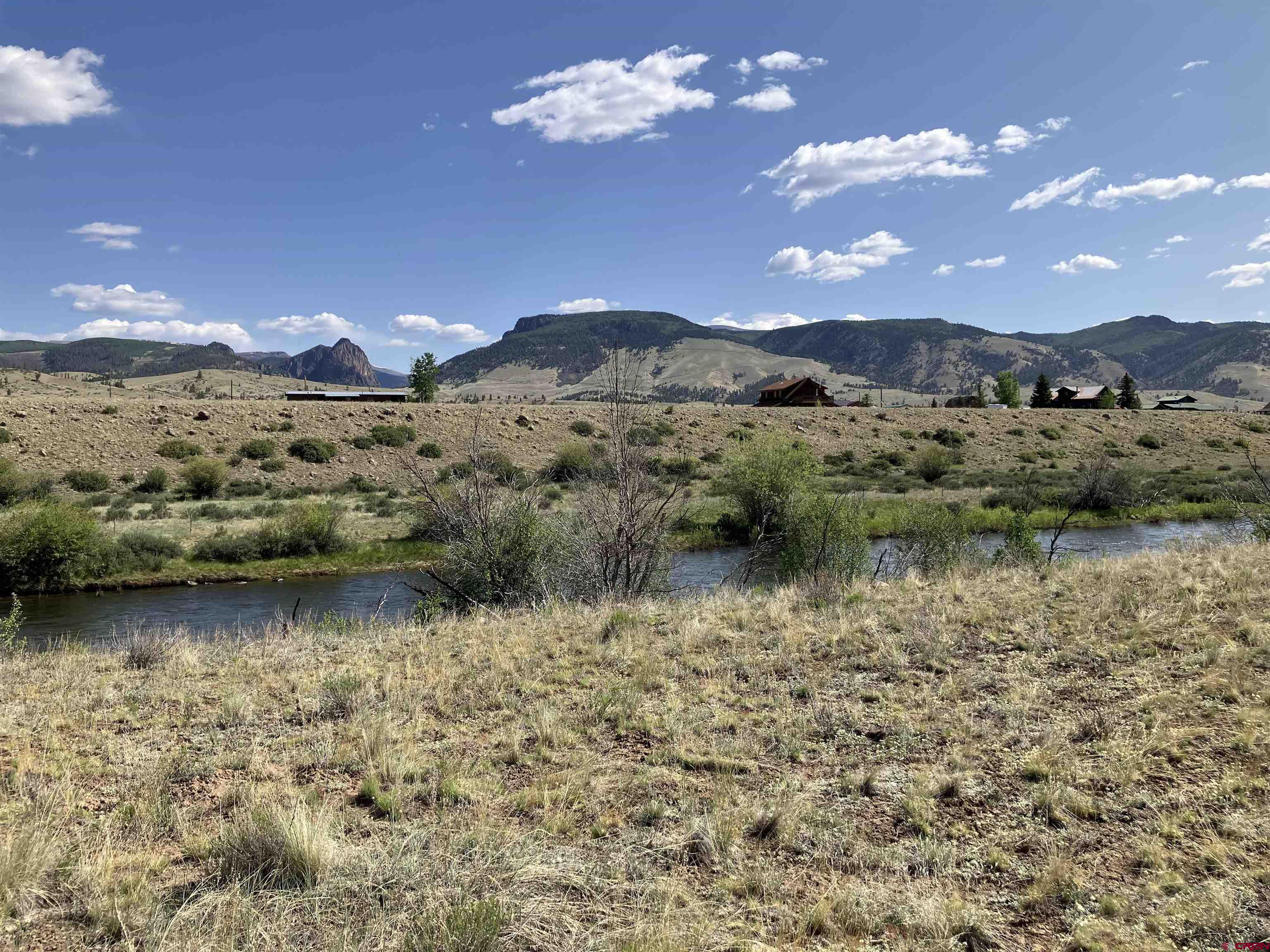 442 Deep Creek Road Creede, CO 81130 - Photo 30 of 45 a view of a lake with sunset